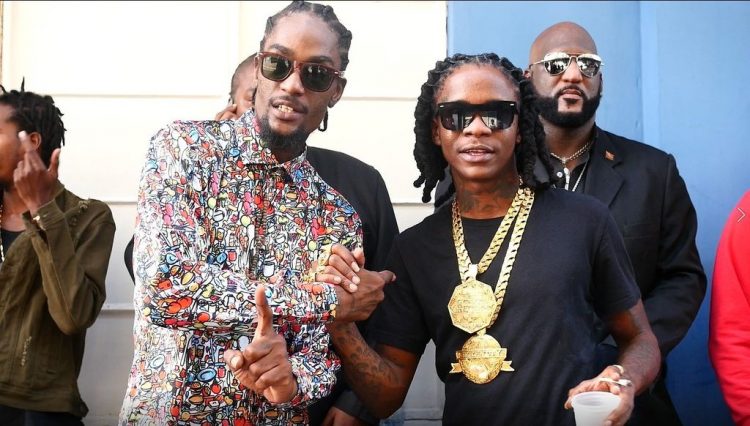 Dancehall stars Toppy Boss, left and Prince Swanny shake hands after last Saturday’s dancehall peace meeting at the plannings at George Street, Port-of-Spain.
(Joshua Seemungal photo)