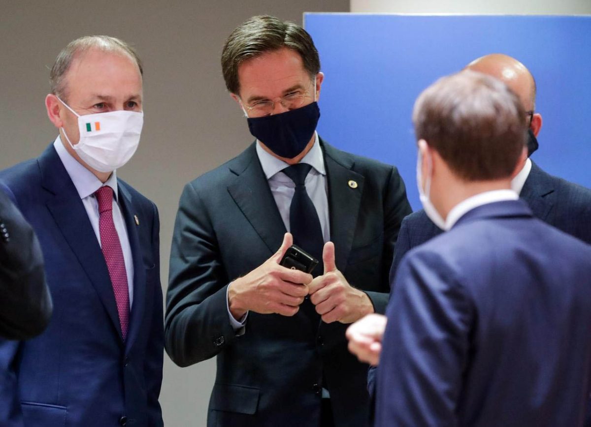 reland's Taoiseach Micheal Martin, Netherlands' Prime Minister Mark Rutte and France's President Emmanuel Macron interact at the last roundtable discussion following a four-day European summit at the European Council in Brussels, Belgium, July 21, 2020. Stephanie Lecocq/Pool via REUTERS
