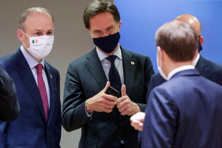 reland's Taoiseach Micheal Martin, Netherlands' Prime Minister Mark Rutte and France's President Emmanuel Macron interact at the last roundtable discussion following a four-day European summit at the European Council in Brussels, Belgium, July 21, 2020. Stephanie Lecocq/Pool via REUTERS
