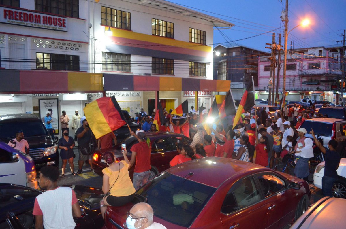 Supporters outside of the PPP’s Headquarters (Freedom House) on Robb Street yesterday afternoon. (Orlando Charles Photo)