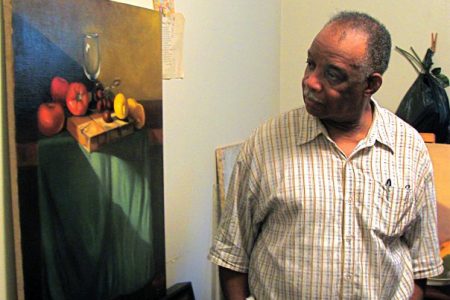Maurice Jacobs with one of his paintings
