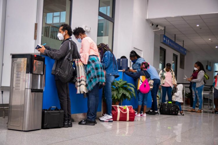 Arriving passengers being processed (DPI photo)