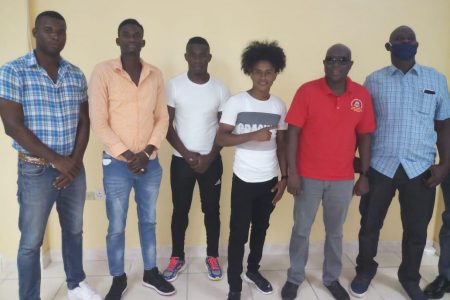The four boxers, Dennis Thomas, Colin Lewis, Desmond Amsterdam and Keevin Allicock pose for a photo with President of the GBA, Steve Ninvalle and the association’s Technical Director, Terrence Poole following their psychological evaluations yesterday.

