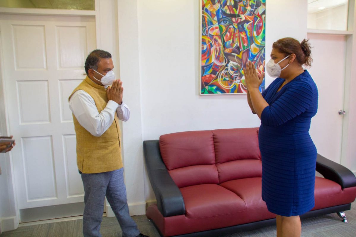 High Commissioner of India to Guyana, Dr K J Srinivasa and  Minister of Education Priya Manickchand greeting each other yesterday at her office. The High Commissioner discussed various avenues of possible cooperation and exchange of best practices in the education sector between India and Guyana, a release from the High Commission said. (Indian High Commission photo)

