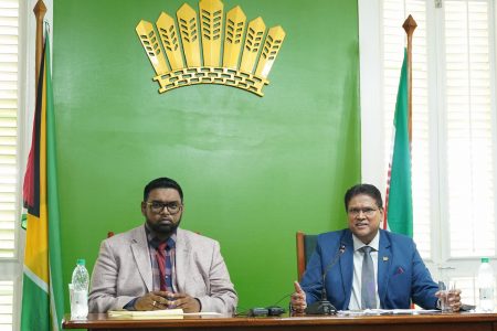 President Irfaan Ali (left) and Suriname’s President  Chandrikapersad Santokhi fielding questions from members of the Press Corps during a press conference yesterday. 