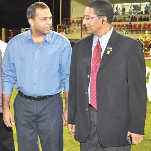 Kashif Muhammad, right, with former Minister of Sports in the PPP/C administration Dr Frank Anthony.
