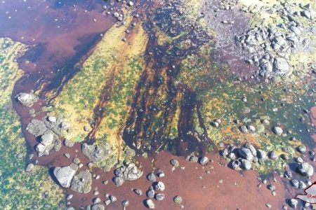 A still image taken from a drone video shows an oil spill after the bulk carrier ship MV Wakashio ran aground on a reef, at Riviere des Creoles, Mauritius, August 8, 2020. REUBEN PILLAY/REUBSVISION.MU, Virtual Tour of Mauritius/via REUTERS