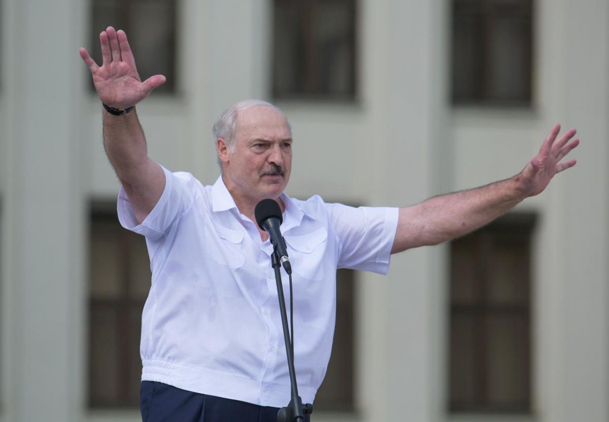 Belarusian President Alexander Lukashenko gestures as he delivers a speech during a rally of his supporters near the Government House in Independence Square in Minsk, Belarus August 16, 2020. REUTERS/Stringer