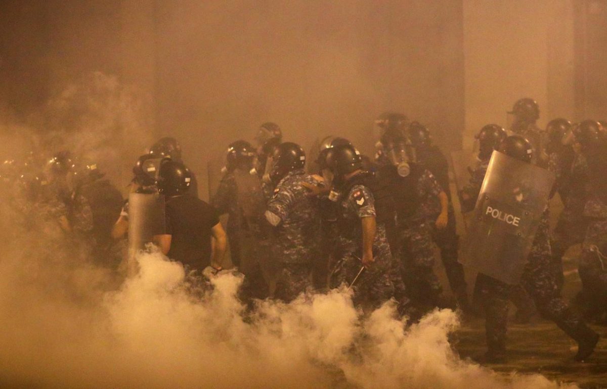 Police officers are seen during a protest following Tuesday's blast, in Beirut, Lebanon August 9, 2020. REUTERS/Hannah McKay