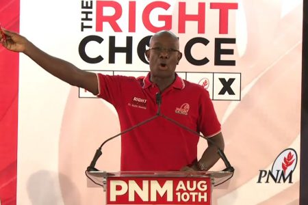 Prime Minister Dr Keith Rowley addresses a PNM meeting in Tunapuna on Wednesday night.