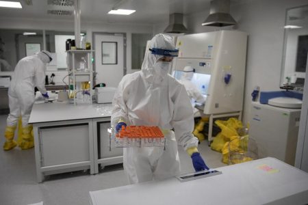Scientists work with samples taken for testing for the coronavirus disease (COVID-19) in the “Huo-Yan” (Fire Eye) National Laboratory for Molecular Detection of Infectious Agents in Belgrade, Serbia May 12, 2020. (REUTERS/Marko Djurica photo)
