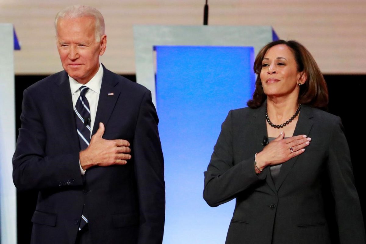 Former Vice President Joe Biden and U.S. Senator Kamala Harris take the stage before the start of the second night of the second U.S. 2020 presidential Democratic candidates debate in Detroit, Michigan, U.S., July 31, 2019. REUTERS/Lucas Jackson/File Photo
