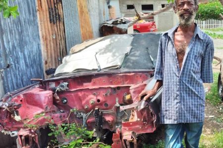 Residents of Mexico in Arnett Gardens are seeking assistance to get 58-year-old deaf-mute Patrick Duncan a home so he can move out of this abandoned car and into a home.