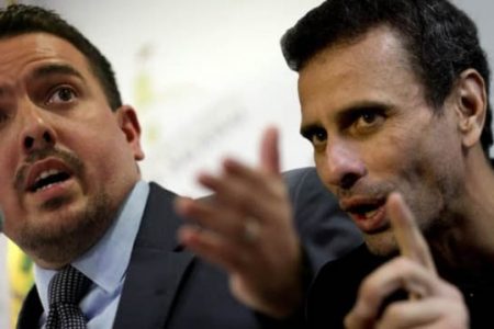 Henrique Capriles (right) and  Stalin Gonzalez
