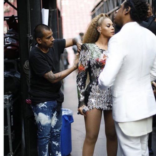 Neal Farinah, left, attends to Beyonce’s hair while her husband Shawn ‘Jay Z’ Carter looks on.