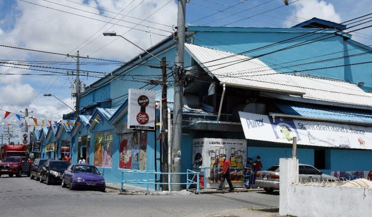 Taken away: Co$$ Cutters supermarket in Sangre Grande where businesswoman Mary Ali was kidnapped yesterday in the car park of the supermarket by two men.