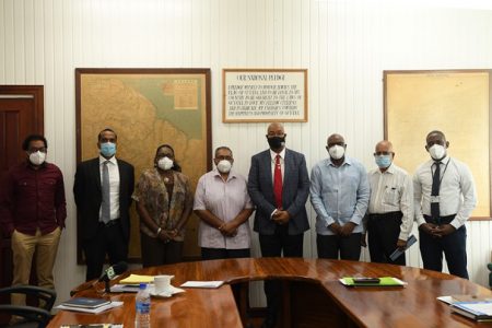 Minister of Public Works Juan Edghill (fourth from right) with the members. (Ministry of Public Works photo)
