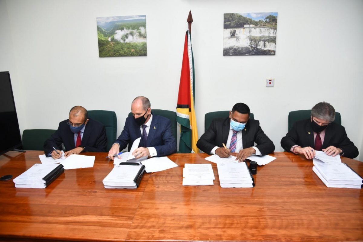 From left to right are: Anand Gohil – Executive, CNOOC Petroleum Guyana Limited; Alistair Routledge – President of Esso Exploration and Production Guyana Limited; Vickram Bharrat, Minister of Natural Resources and Timothy Christian – Director and Vice President of Hess Guyana Exploration. (DPI photo)