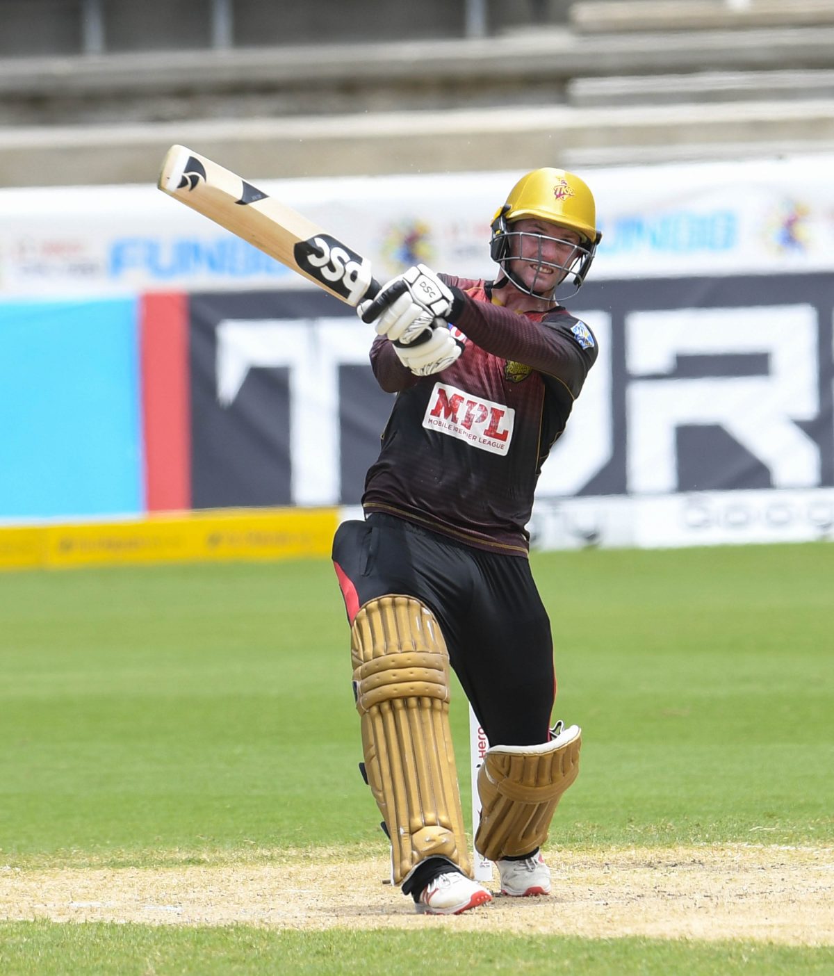 New Zealander Colin Munro hits out during his top score of 65 yesterday. 