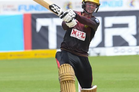 New Zealander Colin Munro hits out during his top score of 65 yesterday. 