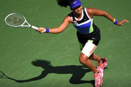 Japan’s Naomi Osaka prepares to play a forehand during her match against Marta Kostyuk at the U.S Open yesterday. (Reuters photo)