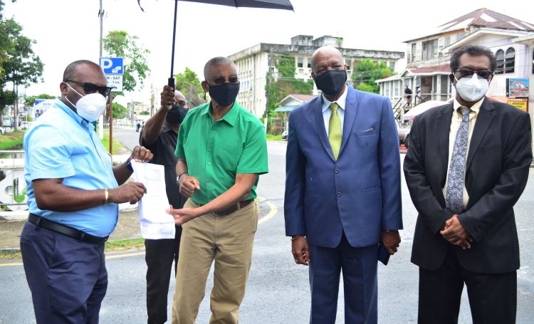 From left with the petition are attorney Roysdale Forde, former President David Granger, Joseph Harmon and Khemraj Ramjattan. (Orlando Charles photo)