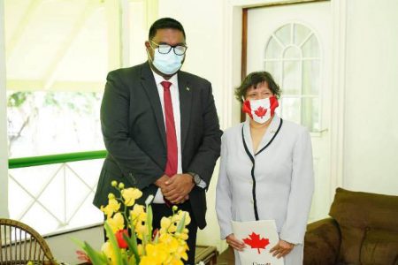 President Irfaan Ali (left) and Canadian High Commissioner Lilian Chatterjee (DPI photo)