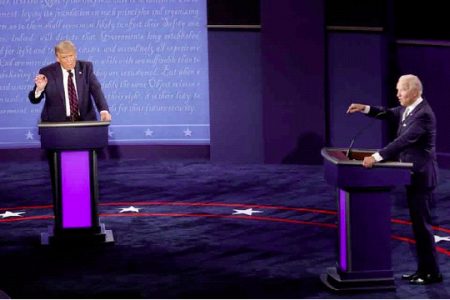 US President Donald Trump and Democratic presidential nominee Joe Biden participate in their first 2020 presidential campaign debate held on the campus of the Cleveland Clinic at Case Western Reserve University in Cleveland, Ohio, Sept 29, 2020. REUTERS