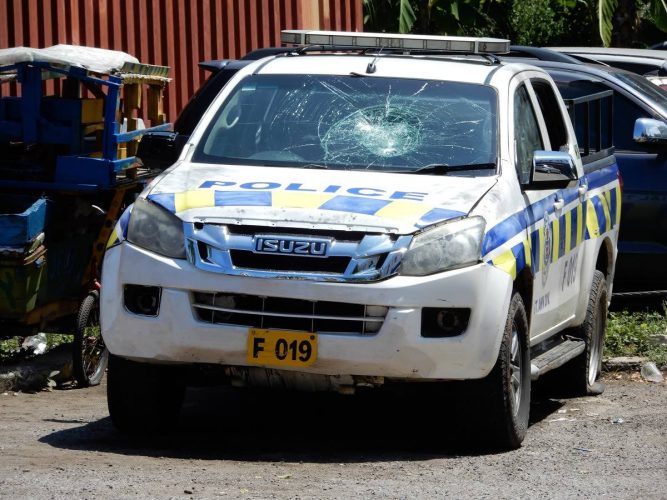 The police vehicle that was damaged by defiant partygoers in Parry Town, St Ann.
