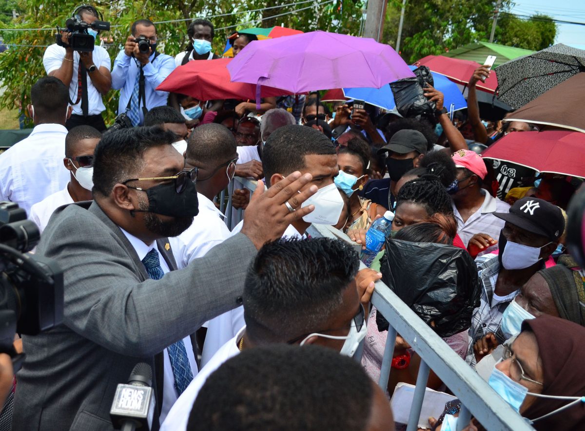 President Irfaan Ali speaking to a crowd of persons who attended the “Dream Realised” Land Title Distribution Ceremony hosted yesterday by the Ministry of Housing and Water at the National Stadium at Providence (Orlando Charles photo) 