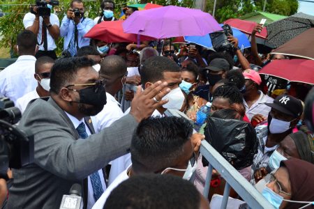 President Irfaan Ali speaking to a crowd of persons who attended the “Dream Realised” Land Title Distribution Ceremony hosted yesterday by the Ministry of Housing and Water at the National Stadium at Providence (Orlando Charles photo) 