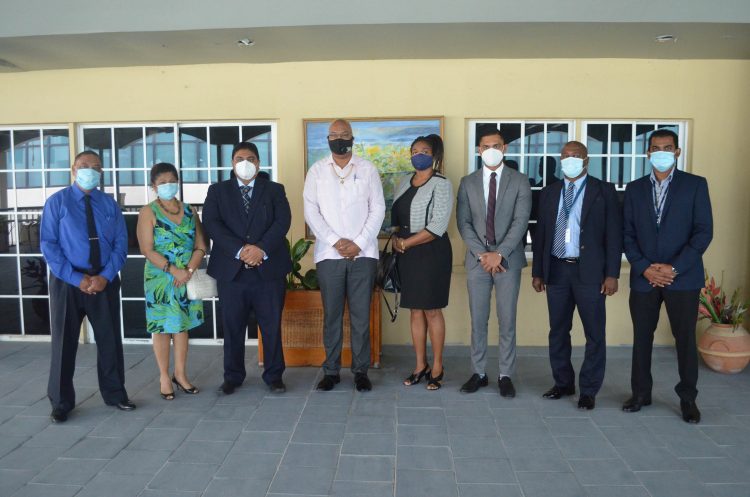 Minister of Public Works Juan Edghill (fourth from left) with members of the new CJIA Board of Directors after their installation yesterday. From left are David Ramdehol, Savitree Sharma, Chairman Sanjeev Datadin, Daun Ellis, Dr Amarnauth Dukhi, Sean Richmond and Chief Executive Officer of CJIA Ramesh Ghir. (Orlando Charles Photo)
