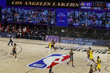 The LA Lakers (yellow) and the Sacramento Kings are contesting a fixture in the 2020 NBA Bubble, which is also known as the Disney Bubble or Orlando Bubble, in the isolation zone at Walt Disney World in Bay Lake, Florida.