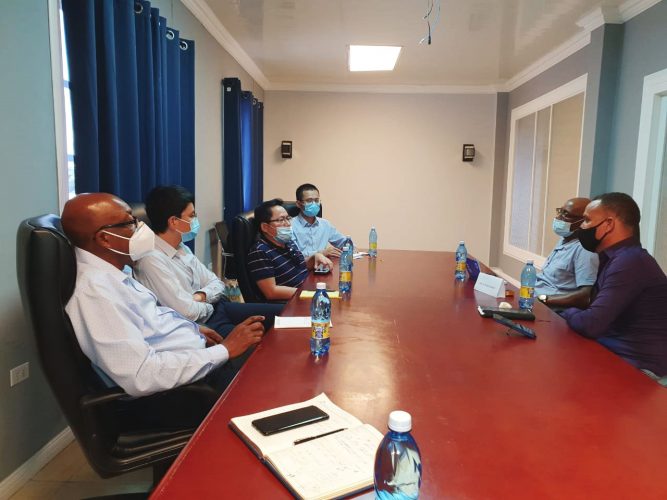 (From left to right) Peter Benny, Victor Wu, Peter Luo, and Frank Liu meeting with Sherwyn Downer and Lindon Joseph yesterday
