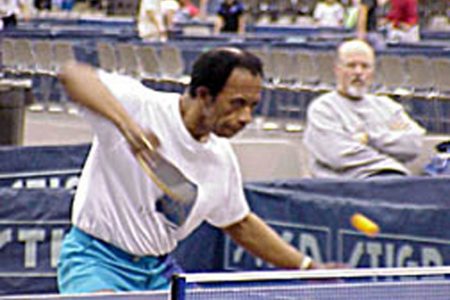 George `The Chief’ Braithwaite seen executing his famous backhand serve.

