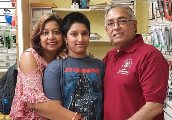 he did it: Jayden Persad, above with his parents, Ramchand and Cynthia, and at right.