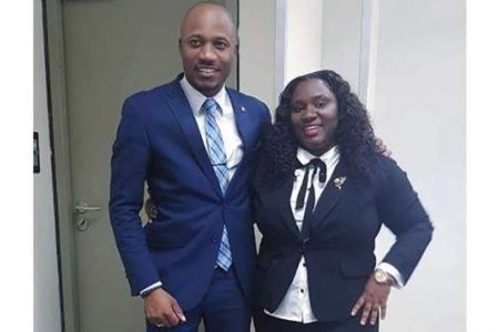 Dwayne and Feleca Jonas share a photo during their tenure at Norman Manley Law School