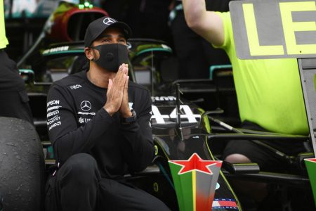 GIVING THANKS! Lewis Hamilton says a prayer after his record 92nd career win yesterday. (Reuters photo)
