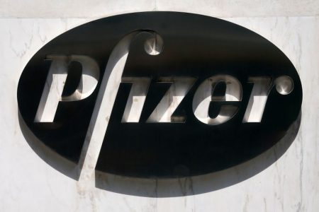 FILE PHOTO: A sign is pictured outside Pfizer Headquarters in the Manhattan borough of New York City, New York, U.S., July 22, 2020. REUTERS/Carlo Allegri/File Photo