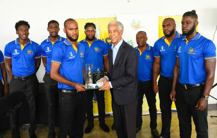 Sir Garry Soberts presents the Headley/Weekes Trophy to Barbados Pride captain Kraigg Brathwaite.
