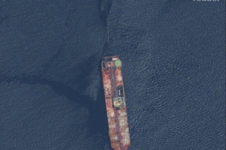 This satellite image released by Maxar Technologies shows the FSO Nabarima oil tanker off the coast of Trinidad and Tobago, Sunday, Aug. 9, 2020. The oil tanker listing off a remote Venezuelan coastline is triggering international calls for action. Critics of President Nicolas Maduro and maritime experts say the FSO Nabarima is taking on water and could sink