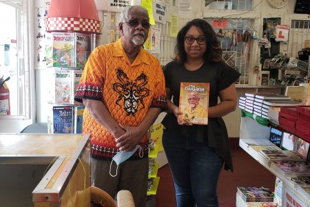 Alan A Fenty along with the winner of the Dr Paloma Mohamed-Martin Prize for Playwriting Drama, Gabrielle Mohamed, during a signing on Friday at Austin’s Book Services 