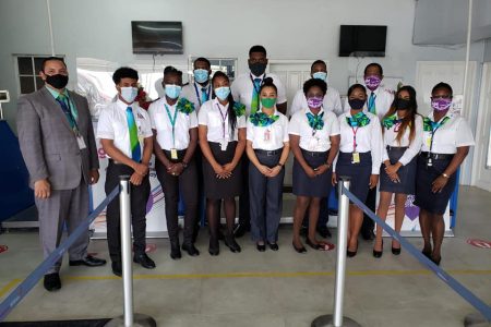 Caribbean Airlines staff who will be responsible for the operation of the new service between the Eugene F Correia International Airport at Ogle, and the Grantley Adams International Airport in Barbados (CAL photo)