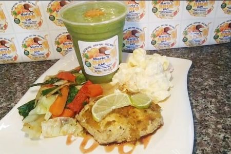 The most popular meal at Mario’s Juice Bar and Grill: Trout and stir fried veggies with a macaroni salad side and a Mario’s smoothie