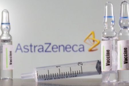FILE PHOTO: A test tube labelled vaccine is seen in front of AstraZeneca logo in this illustration taken, September 9, 2020. REUTERS/Dado Ruvic/Illustration/File Photo/File Photo