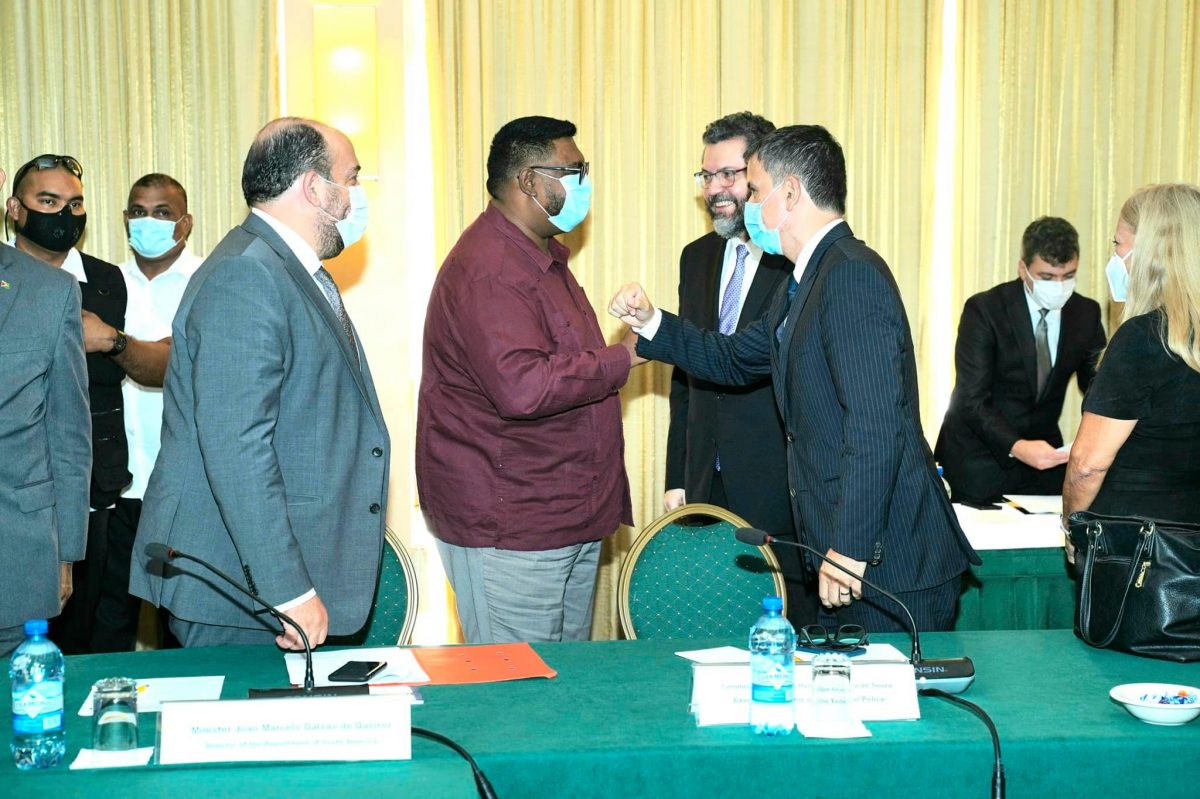 President Irfaan Ali (second from left) with Brazilian officials today