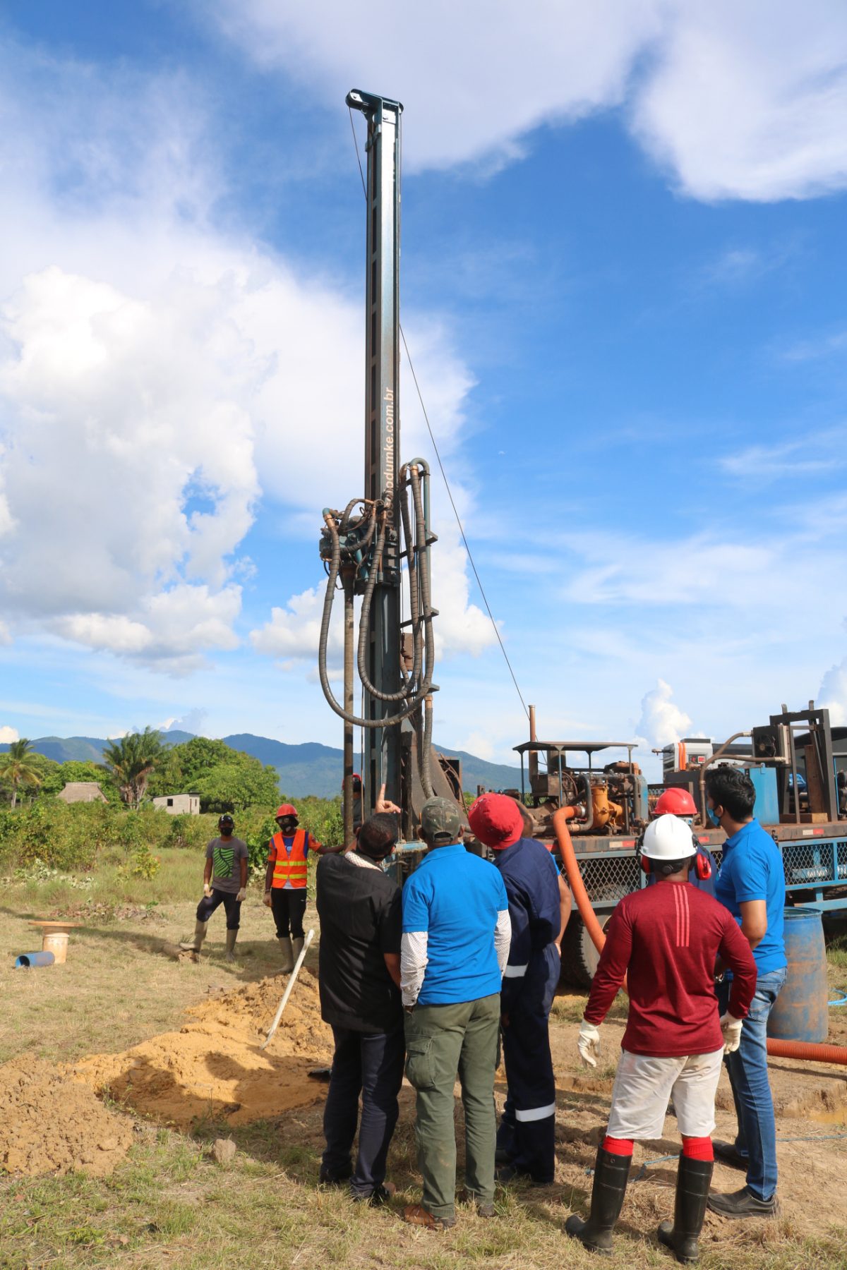 Minister of Housing and Water, Collin Croal and a team of GWI and Regional Officials at the well drilling site in Shulinab.  (GWI photo)