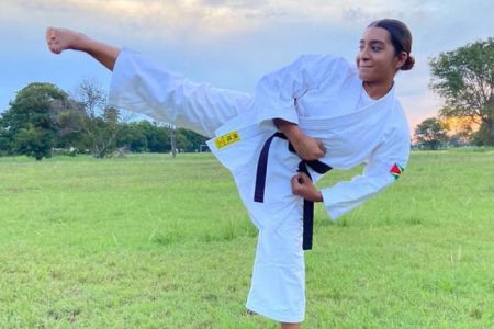 Second Dan Black Belt Karateka of the IKO Karate Academy of Guyana, Chelsea Ram demonstrating a yoko-geri kekomi – side thrust kick - to karate students during an open air training session.