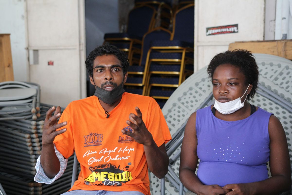Justin Roopchan, left, speaks about how he and his wife Tiffany Sylvester and their two babies now live at a storage facility in San Juan, after the family was rendered homeless In August this year.