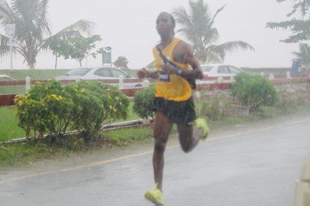 Cleveland Thomas finished the final 7.2km of the Asics World Ekiden 2020 soaked from the rainfall in 24m:15s. (Emmerson Campbell photo)